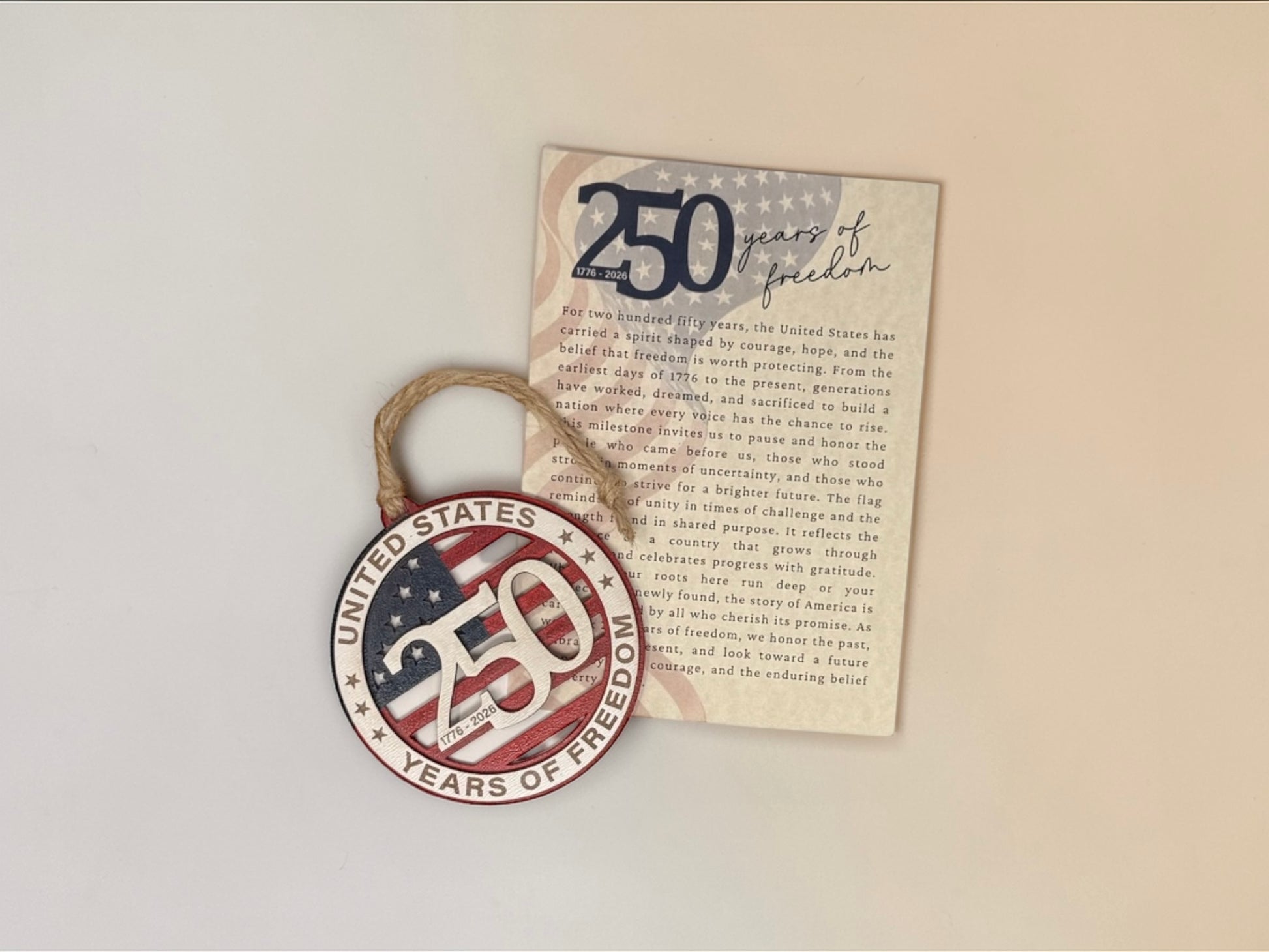 Decorative item with '250 years of freedom' text and American flag design on a plain background