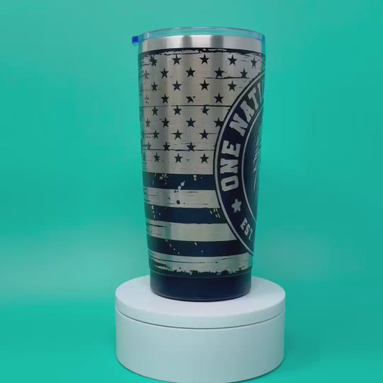 Tumbler with an eagle design and text "One Nation Under God USA Est 1776"