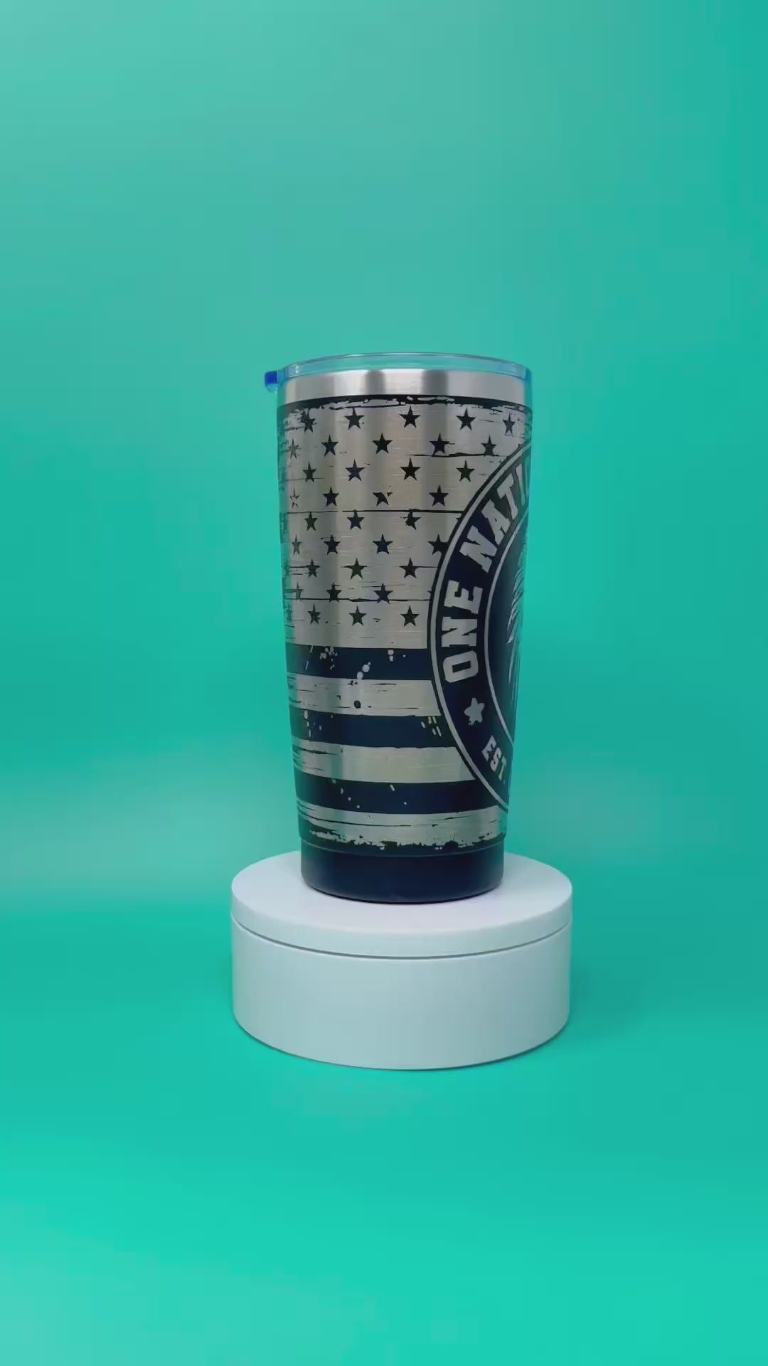 Tumbler with an eagle design and text "One Nation Under God USA Est 1776"