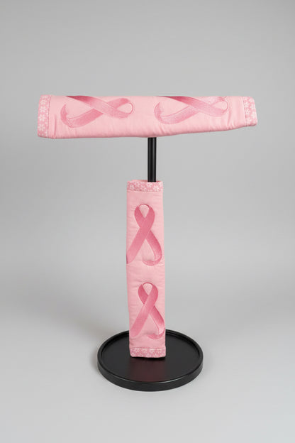 2 seat belt covers in pink with breast cancer ribbons